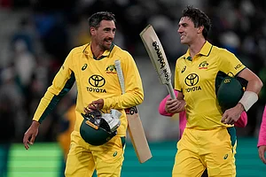 | Photo: AP/Asanka Brendon Ratnayake : Australia Vs Pakistan, 1st ODI: Australia's not-out batters Pat Cummins, right, and Mitchell Starc walk off the ground after their win