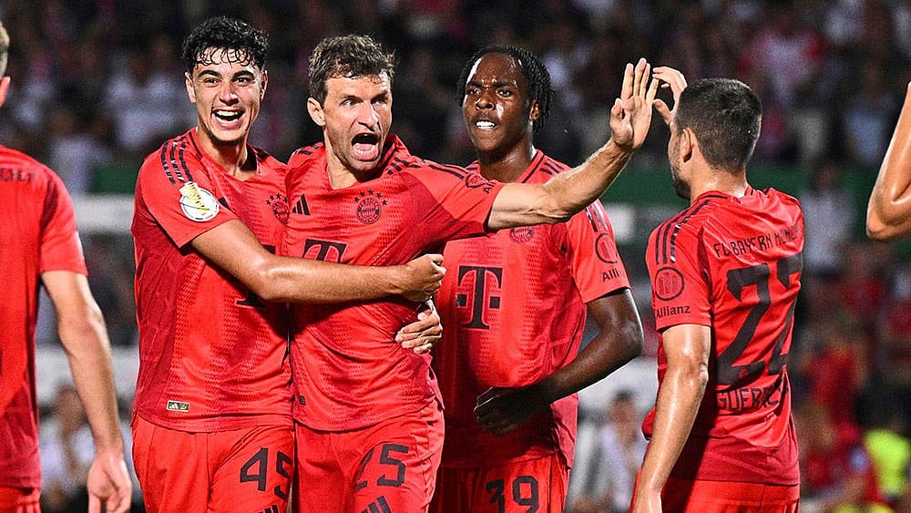 | Photo: Tom Weller/dpa via AP : DFB-Pokal Ulm vs Bayern Munich: Thomas Müller celebrates after scoring a goal 