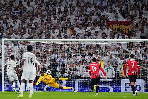 Champions League 2024-25: Real Madrid's Vinicius Junior, left, scores from the penalty spot