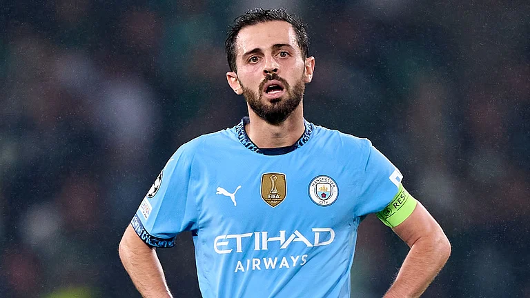 Silva looks on during City's defeat by Sporting - null
