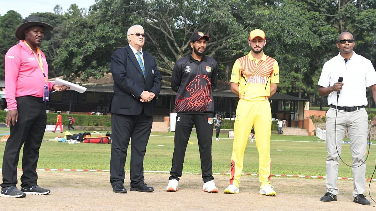 Photo: X | Uganda Cricket Association : Uganda and Singapore cricket team skippers during the toss of match 1 of the ICC CWC Challenge League B 2024-26 in Entebbe.