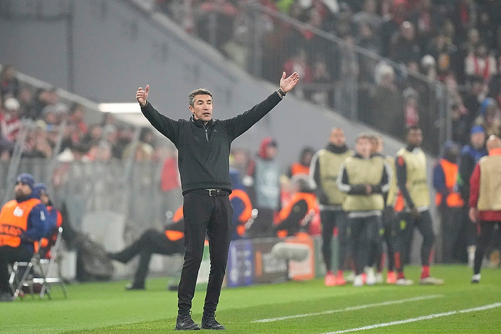 UEFA Champions League soccer Bayern Munich and SL Benfica football match_ Bruno Lage
