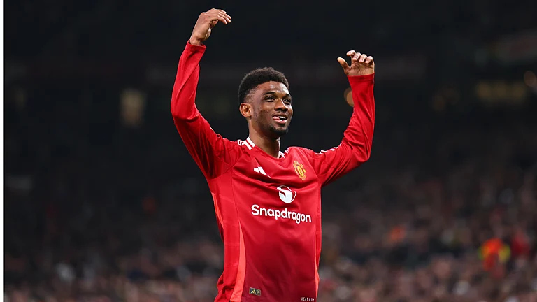 Amad Diallo celebrates for Manchester United. - null