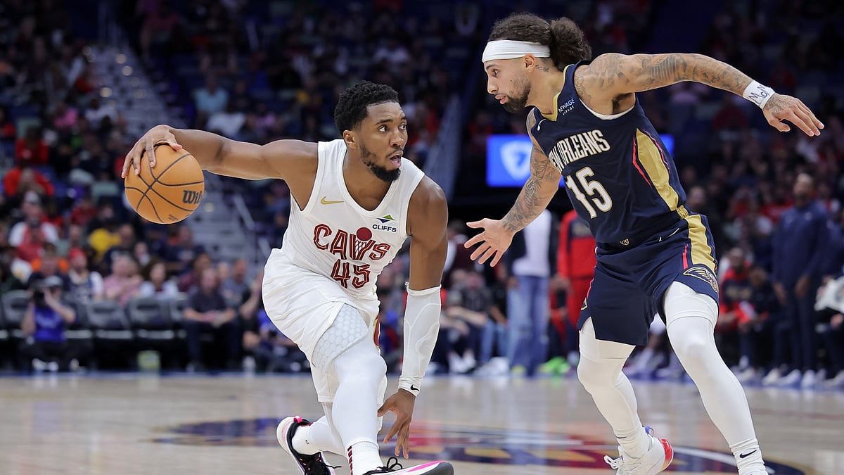 Donovan Mitchell #45 of the Cleveland Cavaliers drives against Jose Alvarado #15 of the New Orleans Pelicans during the second half at the Smoothie King Center on November 06, 2024 in New Orleans, Louisiana. - null