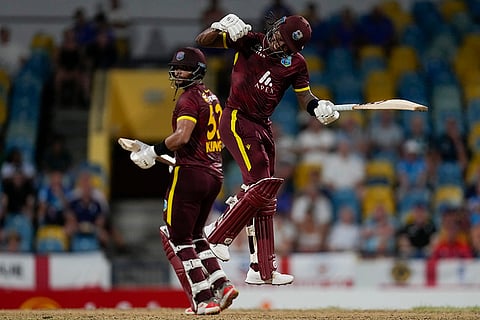 WI Vs ENG, 3rd ODI: West Indies' Keacy Carty celebrates after Brandon King, left, scored a century