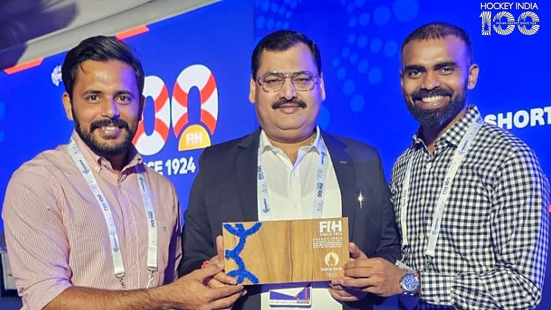 Hockey India : Harmanpreet Singh with PR Sreejesh and Hockey India Secretary General Bhola Nath Singh during the ceremony.