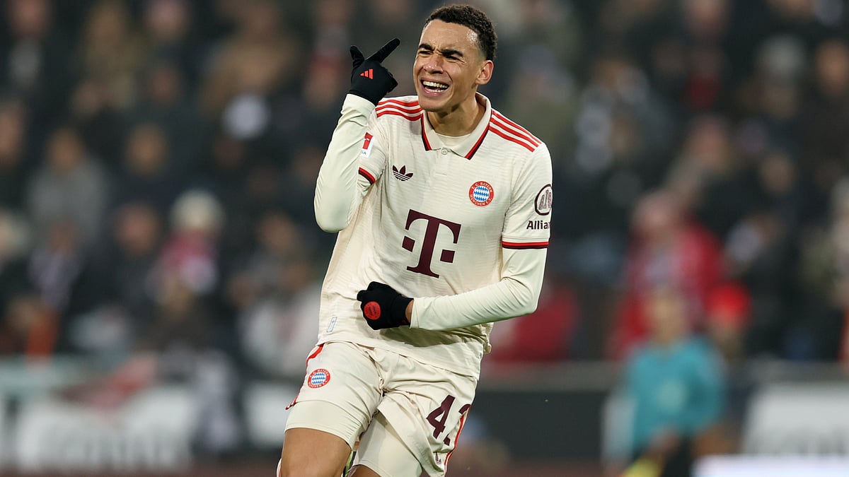Jamal Musiala celebrates his first-half finish on Saturday - null
