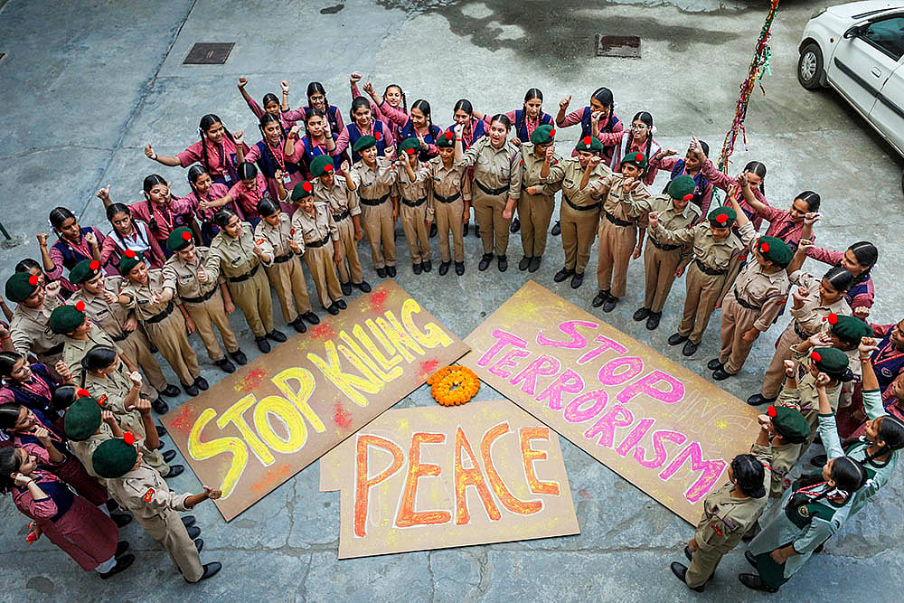 |  Photo: PTI : Students raise slogans against terror attacks in J-K