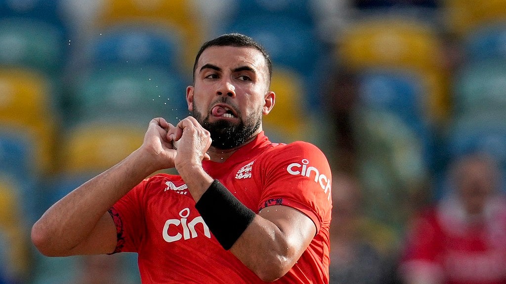 Photo: AP/Ricardo Mazalan : England's Saqib Mahmood bowls during the first T20I against West Indies in Barbados.