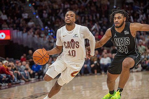 NBA: Cavaliers' Darius Garland (10) drives past Nets' Cam Thomas (24) 
