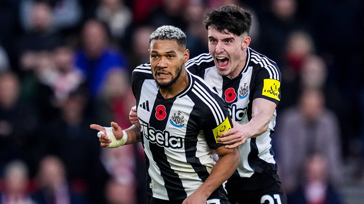 Joelinton celebrates his brilliant strike - null