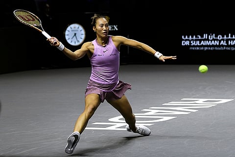 WTA Finals: China's Qinwen Zheng plays a shot against Coco Gauff of the U.S.