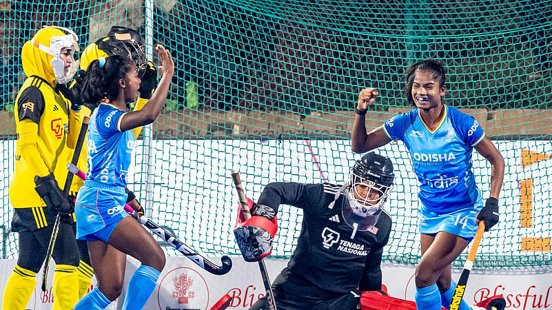 Indias Sangita Kumari during the match against Malaysia.