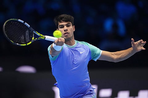 ATP Finals: Spain's Carlos Alcaraz returns the ball to Norway's Casper Ruud