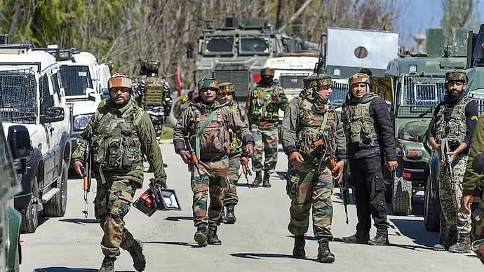 An encounter breaks out between the security forces and militants  - PTI