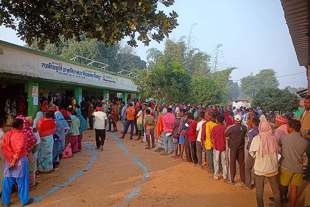 Jharkhand Assembly elections phase 1 voting_Voters wait in queues