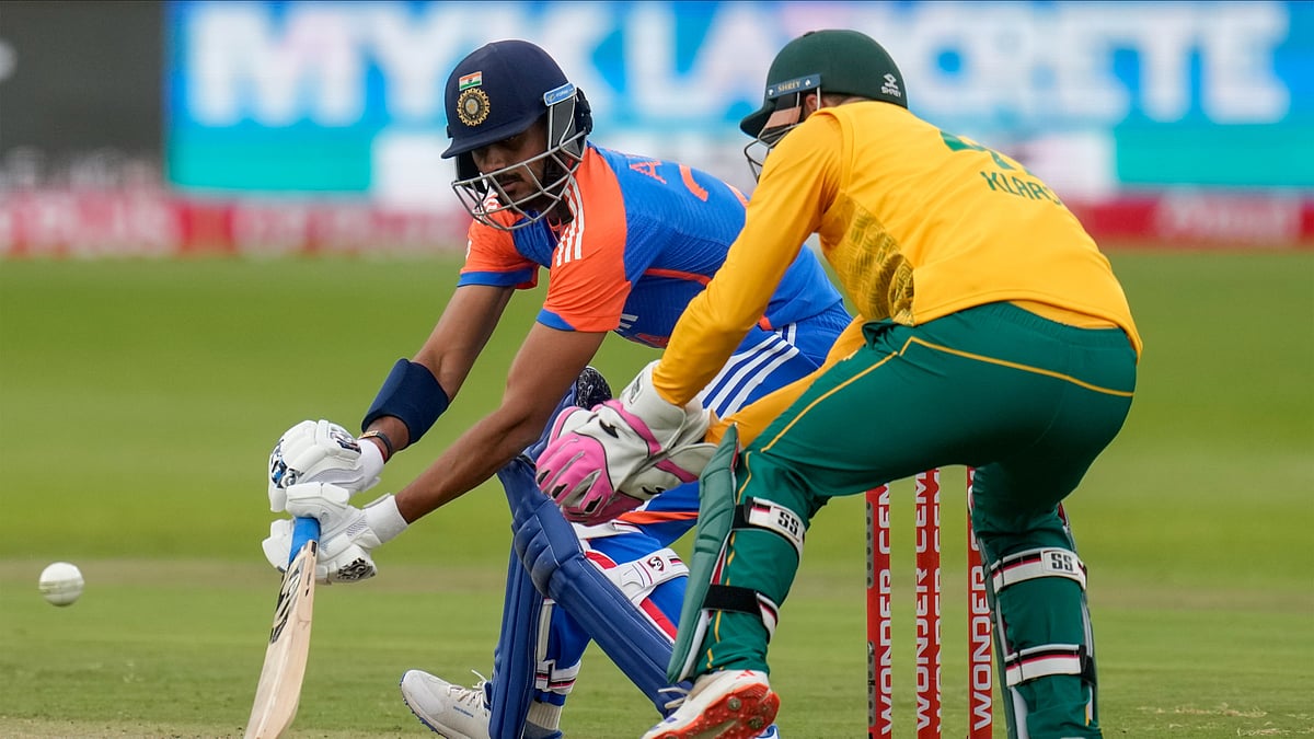 AP Photo/Themba Hadebe : India's Axar Patel plays a shot during the second T20 cricket match between South Africa and India at St. George's Park in Gqeberha, South Africa.