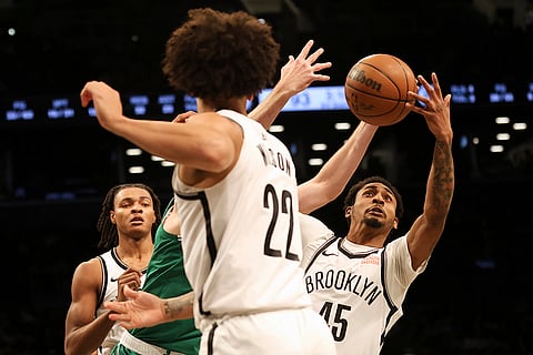 NBA: Nets' Keon Johnson goes for a rebound 