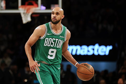 NBA: Celtics' Derrick White brings up the ball