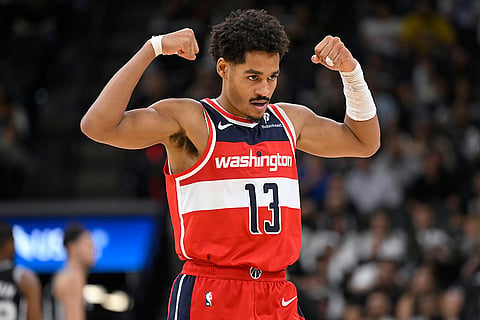 NBA: Wizards guard Jordan Poole celebrates a basket 