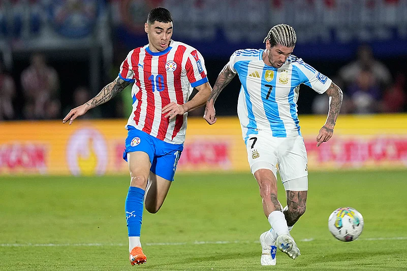 FIFA World Cup 2026 Qualifiers Paraguay vs Argentina soccer match photos_Rodrigo De Paul