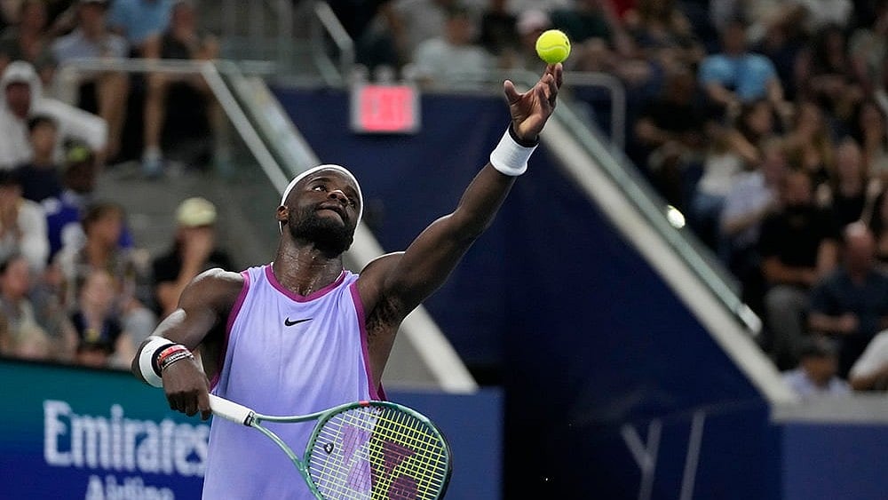 | Photo: AP/Pamela Smith : US Open 2024: Frances Tiafoe serves to Aleksandar Kovacevic 