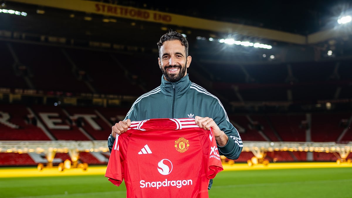 Ruben Amorim poses at Old Trafford - null