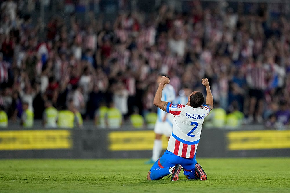 | Photo: AP/Jorge Saenz : FIFA World Cup 2026 Qualifiers: Paraguay's Gustavo Velazquez celebrates winning against Argentina