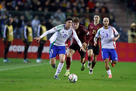 UEFA Nations League soccer: Italy's Alessandro Bastoni, left, is pursued by Belgium's Arne Engels