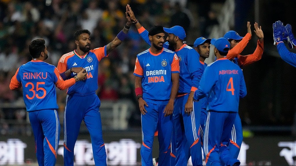 AP/Themba Hadebe : India celebrate the wicket of South Africa's Ryan Rickelton during the fourth T20I in Johannesburg.