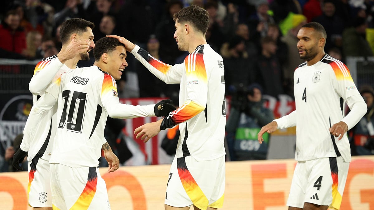 Jamal Musiala of Germany celebrates scoring - null
