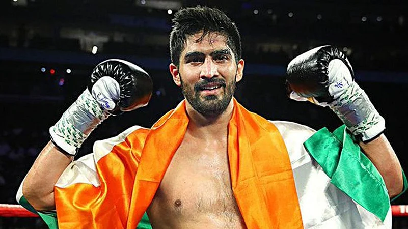 Boxer Vijender Singh offers a role in his next film to Rajpal Yadav
