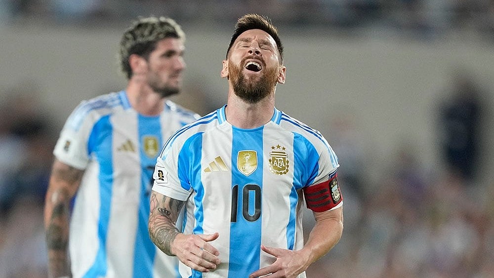Photo: AP/Natacha Pisarenko : World Cup 2026 Qualifying Soccer: Argentina captain Lionel Messi reacts.