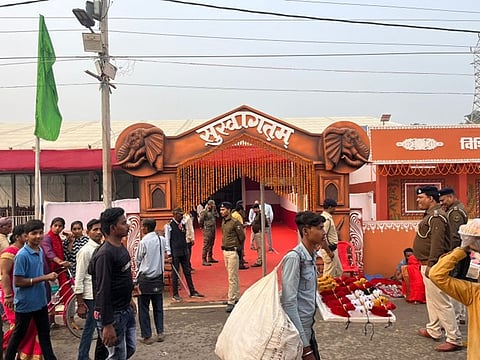 Visitors at the entry gate of the fair
