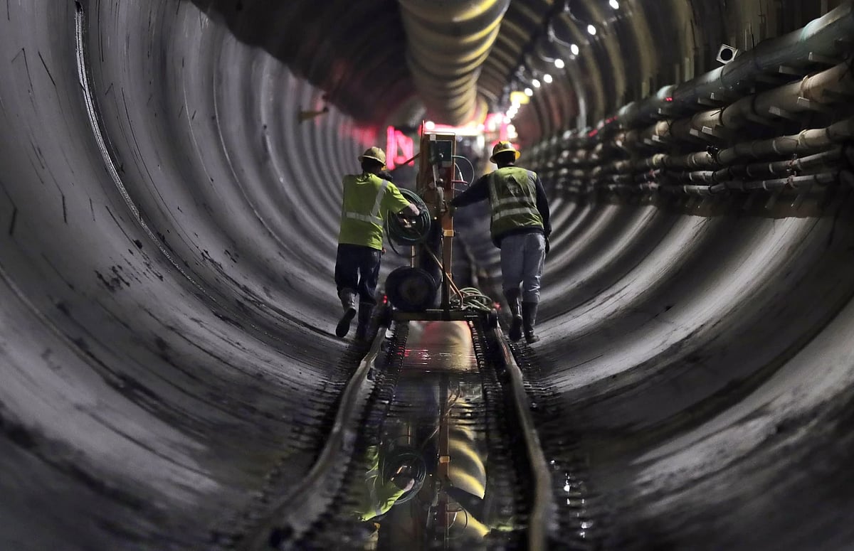 AP : Tunnel workers inside an aqueduct 
