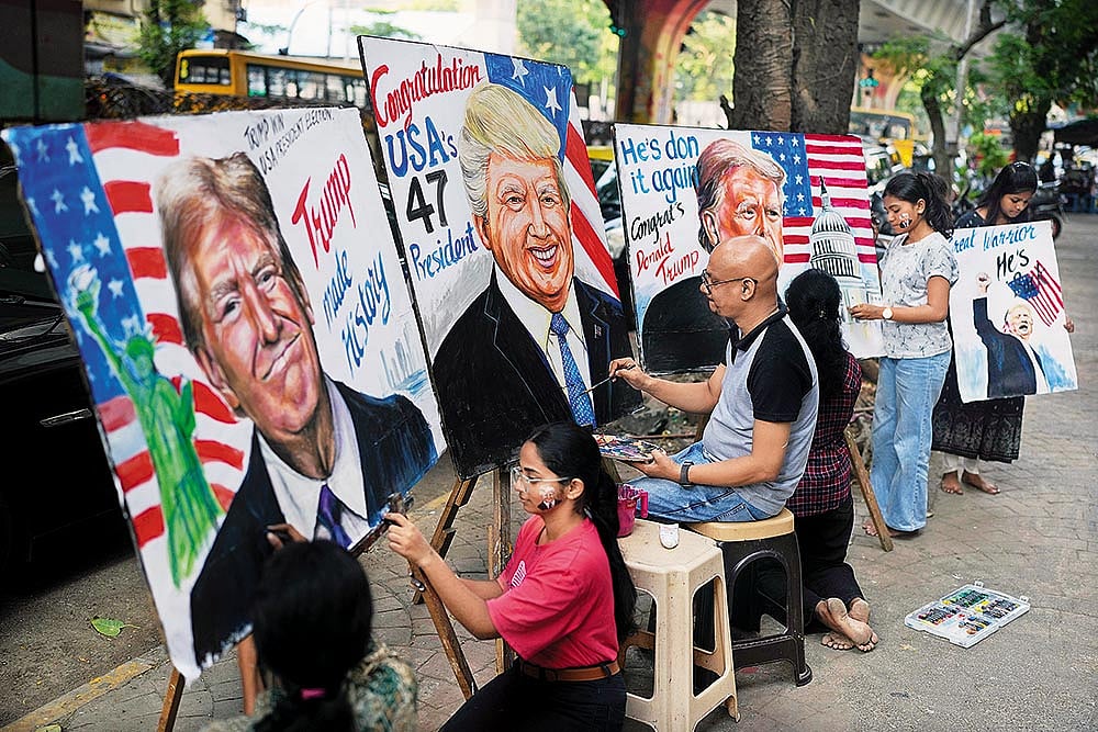 India-US Bonhomie: Students of the Gurukul School of Art paint portraits of Donald Trump in Mumbai on November 6, 2024 - | Photo: AP