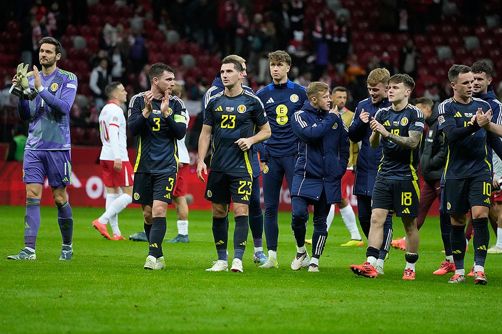 | Photo: AP/Czarek Sokolowski : Nations League Soccer: Scotland players greet the fans after the end of the match