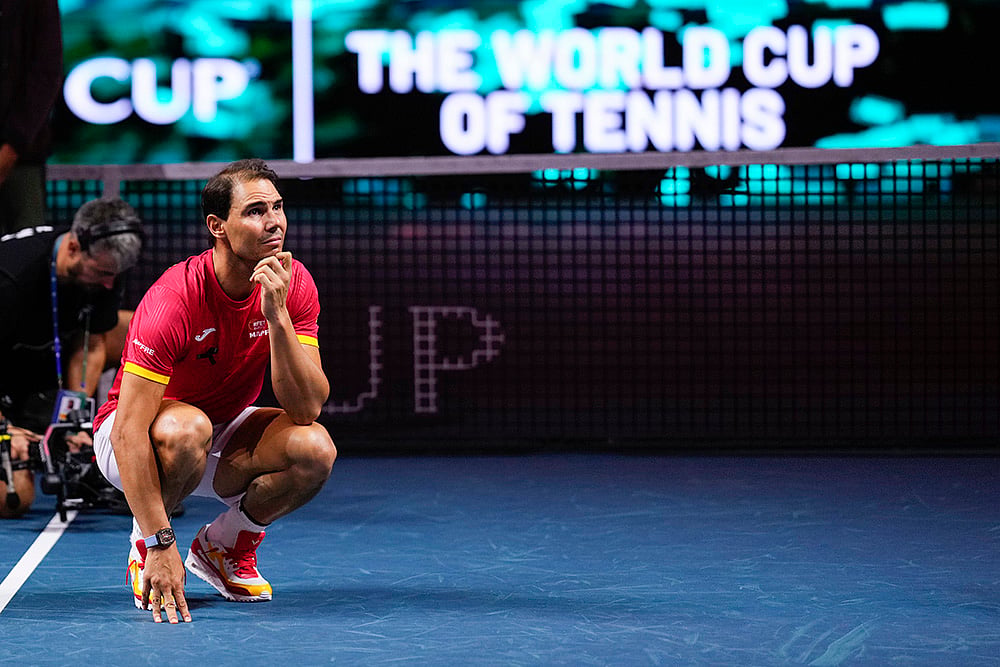 | Photo: AP/Manu Fernandez : Davis Cup 2024 Finals: Spain's Rafael Nadal during a tribute after playing his last match