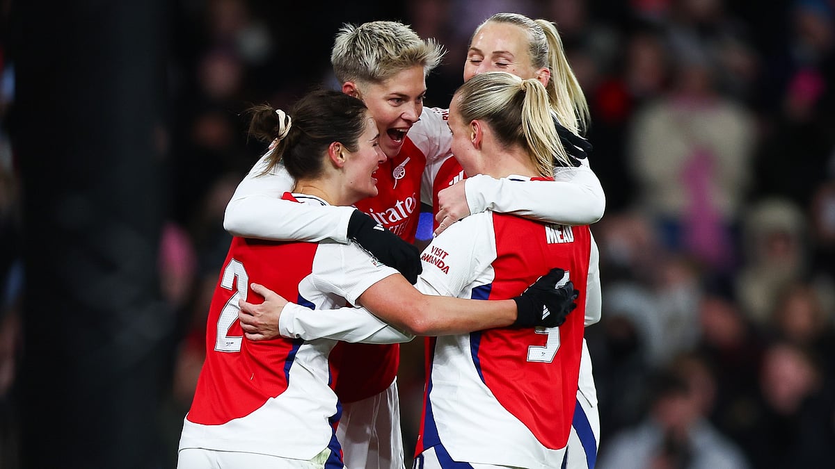Arsenal Women celebrate qualifying for Champions League quarter-final.