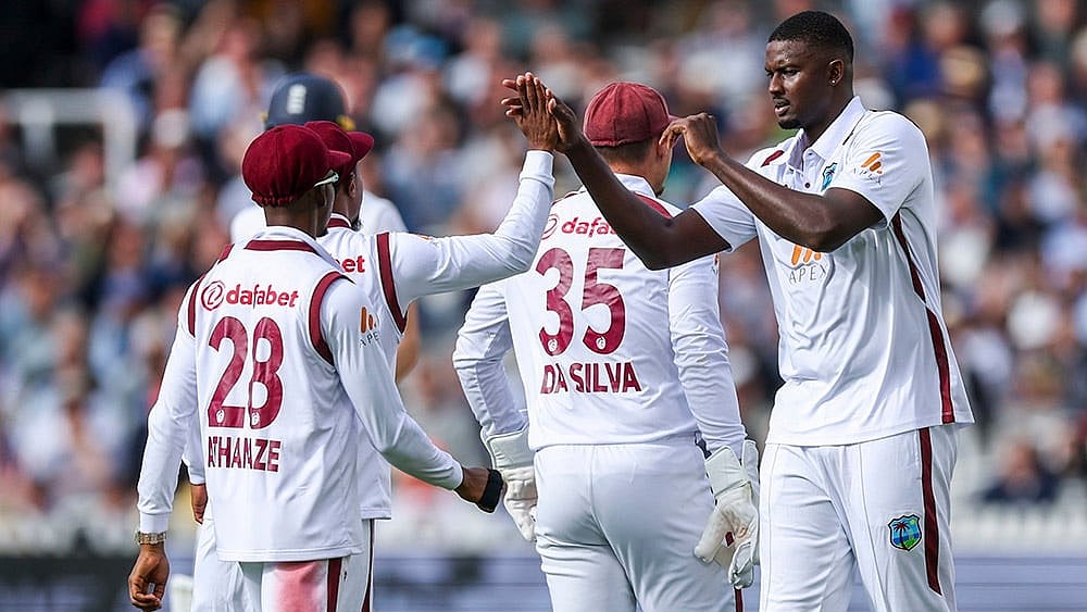 | Photo: Steven Paston/PA via AP : West Indies cricket team in action against Bangladesh.