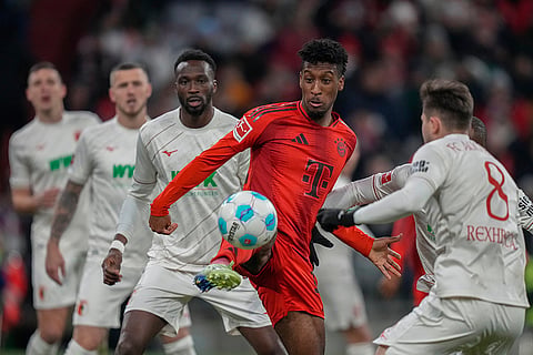 Bundesliga 2024-25: Bayern's Kingsley Coman tries to control the ball 