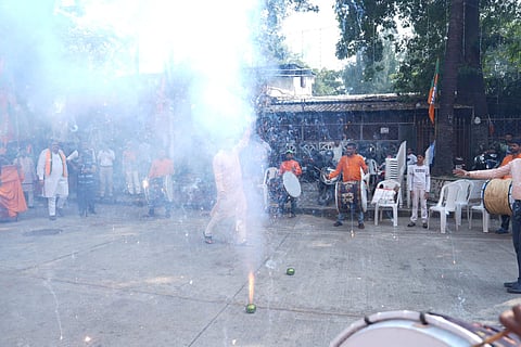 Supporters celebrate outside BJP head office, in Mumbai
