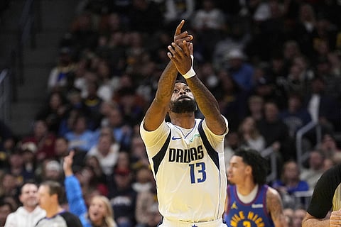 NBA 2024-25: Mavericks forward Naji Marshall celebrates a three point basket