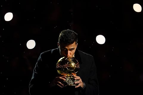 EPL 2024-25: Manchester City's Rodri kisses off his Ballon d'Or (Golden Ball) award
