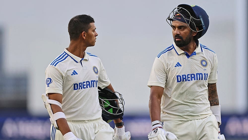 Photo: AP/Trevor Collens : India's Yashasvi Jaiswal, left, and teammate KL Rahul leave the field at the end of play.