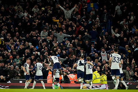 EPL 2024-25: Tottenham's Pedro Porro, 3rd lower left, celebrates with teammates in front of their fans after scoring his side's third goal