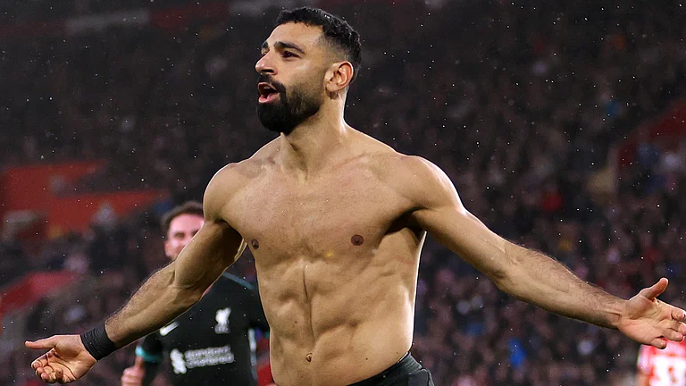Mohamed Salah celebrates after scoring the winner versus Southampton - null