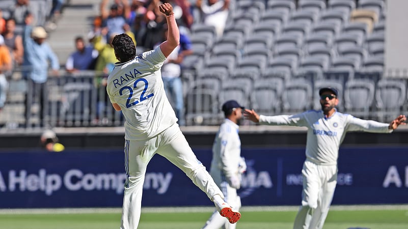 Indias Harshit Rana, left, celebrates the wicket of Australias Alex Carey. AP Photo