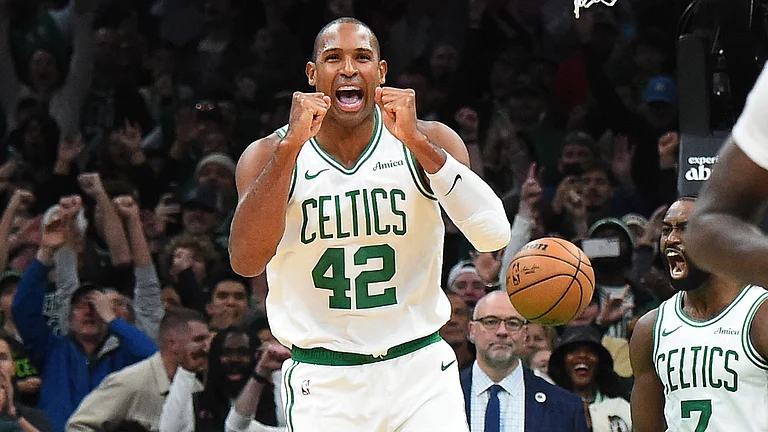 Boston Celtics center Al Horford celebrates following a win over the Minnesota Timberwolves on Nov. 24, 2024. - null