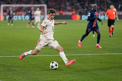 UEFA Champions League: Bayern's Thomas Mueller kicks the ball